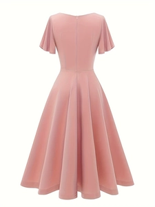 Back view of lotus pink A-line dress featuring ruffled sleeves and slim waist cut
