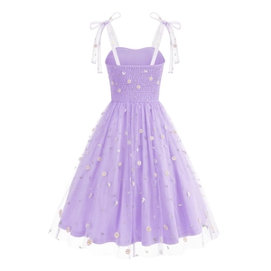 Detail of light purple floral tulle dress with daisy embroidery and organza bow straps