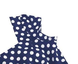 Gros plan détaillé du tissu bleu marine à pois et finitions de couture de haute qualité