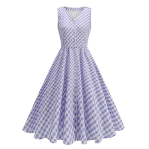 Detail of V-neckline with wavy trim and buttons on purple gingham plaid dress