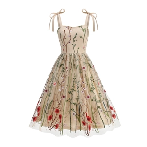 Elegant champagne tulle A-line dress with colorful floral embroidery and bow straps