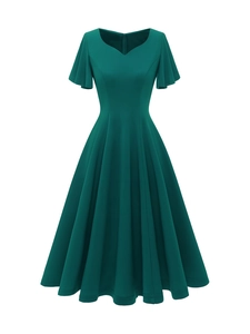 Detail of dark green vintage A-line dress with sweetheart V-neck and ruffled short sleeves