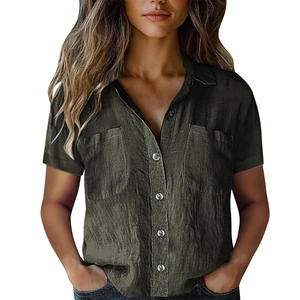 Detail of bamboo linen texture on dark olive short sleeve shirt with flap pockets