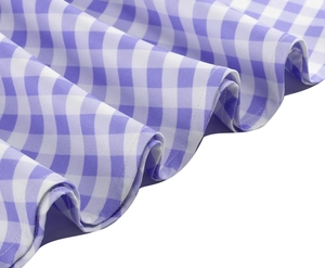 Detailed close-up of purple and white gingham fabric texture with soft pleats and stitching