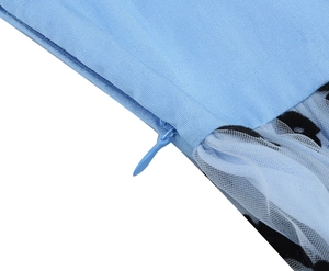 Close-up of invisible zipper and blue mesh splicing on a vintage girls dress