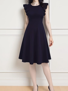 Detail of dark blue sleeveless A-line evening dress with ruffled shoulder accents
