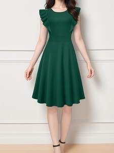 Detailed view of the sleeveless dark green A-line dress with elegant ruffle shoulder design