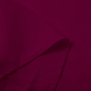 Close-up detail showing the fine stitching and texture of the burgundy linen short sleeve shirt