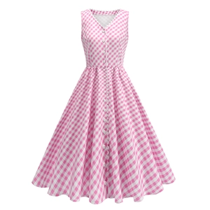 Detail of pink gingham dress with V-neckline, scalloped lace trim and button-front closure