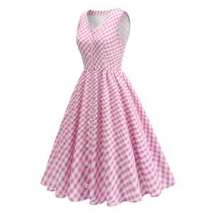 Detail of pink gingham dress with V-neck lace trim and heart-shaped buttons