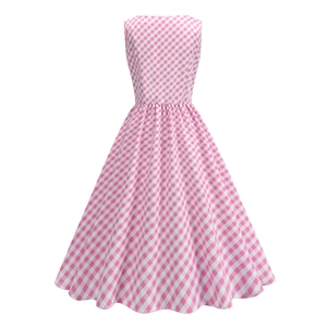 Detail of pink gingham dress featuring a scalloped neckline and pleated waist design