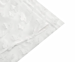 Detailed view of white mesh fabric with 3D butterfly appliques and silver embroidery