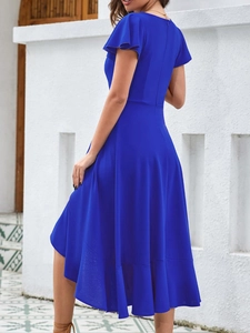Detailed view of royal blue ruffle sleeve evening dress with asymmetrical hem