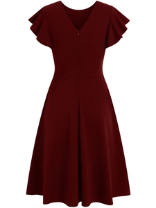 Detailed back view of wine red dress featuring layered ruffle sleeves and hidden zipper