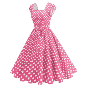 Robe vintage rose à pois style Audrey Hepburn, coupe trapèze avec nœud à la taille
