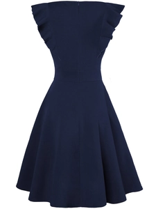 Detail of a dark blue evening dress showing the back invisible zipper and ruffle sleeves