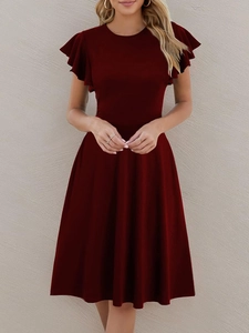 Detail of burgundy dress featuring round neck and elegant ruffle flutter sleeves