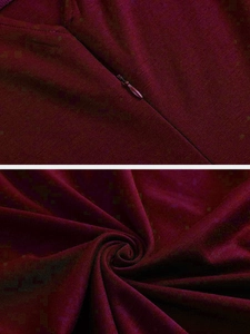 Detailed macro view of dark red knit fabric texture and hidden zipper craftsmanship