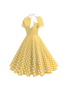 Robe midi vintage jaune à pois blancs avec col à nœud et jupe trapèze évasée