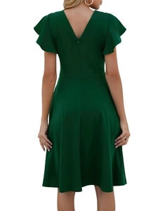 Detail of dark green dress showing V-back design, ruffle sleeves and hidden back zipper