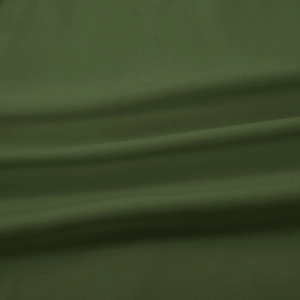 Macro shot of dark olive green faux leather with lychee texture and matte finish