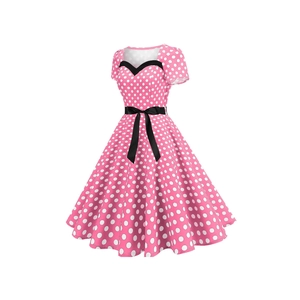 Pink polka dot vintage Audrey Hepburn style A-line dress with heart neckline and bow
