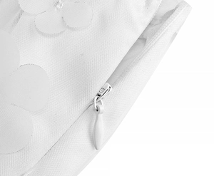 Detail of elegant white mesh lace fabric featuring floral embroidery and invisible zipper
