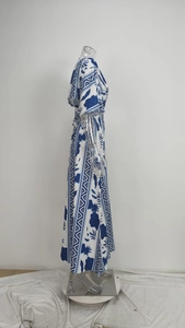 Side view of long floral dress with bohemian print and flowing A-line silhouette