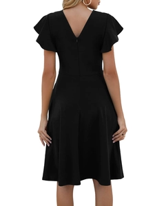 Detail of the back view of a black V-neck backless dress with feminine ruffle sleeves
