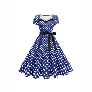 Vintage royal blue polka dot Hepburn style dress with black V-neck and satin bow