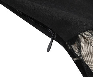 Detail view of the high-quality invisible zipper and sheer mesh panels on this black dress