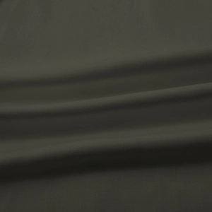 Detail shot of charcoal grey bamboo linen fabric with fine grain texture and soft drape