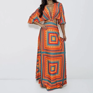 Detail of waist cut-out and tie design on bohemian geometric print maxi dress