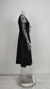Elegant black sleeveless V-neck dress with drawstring detail and flattering high waistline