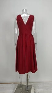 Detailed back view of red V-neck maxi dress with waist cinching and hidden back zipper