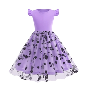 Detail of girls purple dress with ruffled cap sleeves and floral tulle skirt