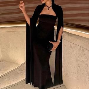 Detail view of the black mermaid evening dress with cape sleeves and slim waistline