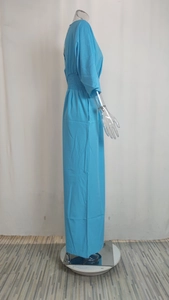 Side view of sky blue long maxi dress featuring elastic waist and elegant pleated details