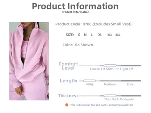Detail view of pink fleece tracksuit set featuring half-zip hoodie and matching pants