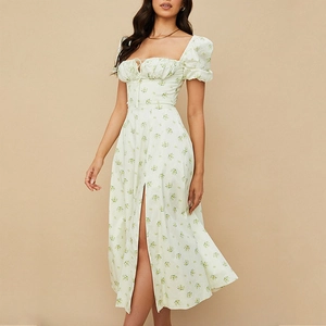 Detail of French floral dress showing square neck, puff sleeves and side split design