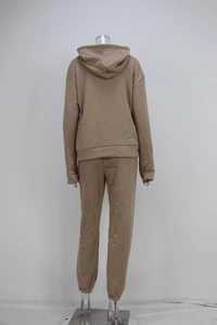 Rear view of camel hooded sweatshirt and matching jogger pants two-piece set