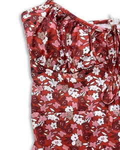 Détail de robe à fleurs avec buste plissé à nouer et fermeture éclair invisible au dos