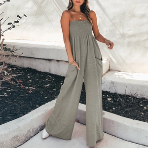 Gray high-waisted wide-leg jumpsuit with spaghetti straps and pleated bust detail