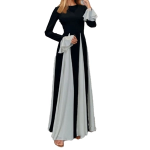 Elegant black and white contrast maxi dress with flared ruffled sleeves and high waist