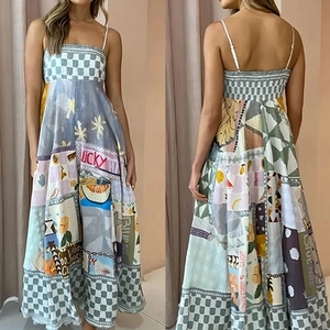 Detail view of maxi dress featuring graffiti print, patchwork patterns and smocked back