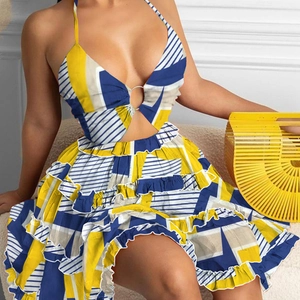 Floral halter neck cutout tiered dress with tiered ruffles and vibrant geometric patterns