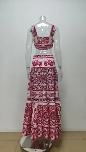 Detailed back view of white and red baroque print crop top with metal zipper detail
