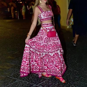 Detail view of baroque print texture on two-piece summer set with tiered maxi skirt
