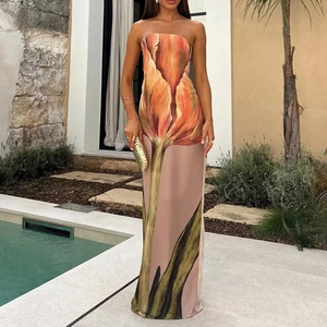 Elegant strapless pink maxi dress featuring a large orange tulip print and silky finish