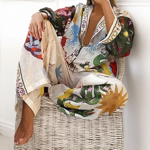 Women's bohemian two-piece set featuring long sleeve printed shirt and wide leg trousers